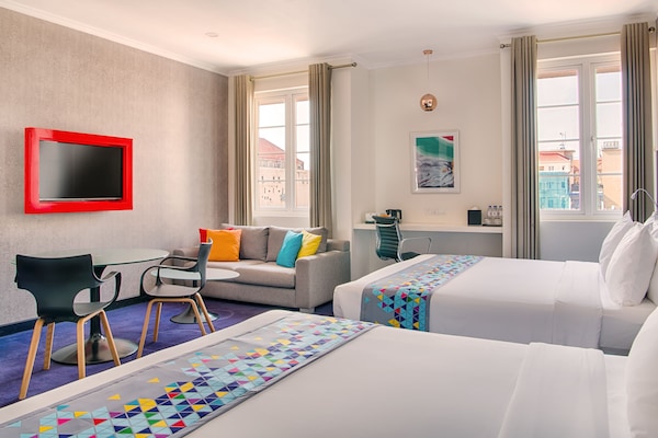 Deluxe Family Room | Premium bedding, in-room safe, individually furnished, desk