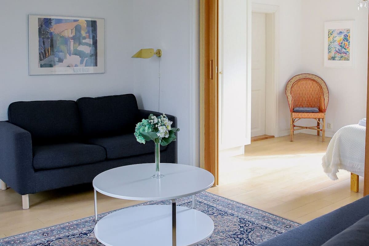 basic apartment, 2 bedrooms, annex building | living area | flat-screen tv