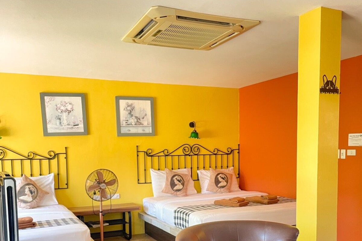 Deluxe Family Room with Balcony | Blackout drapes, WiFi (free), bed sheets