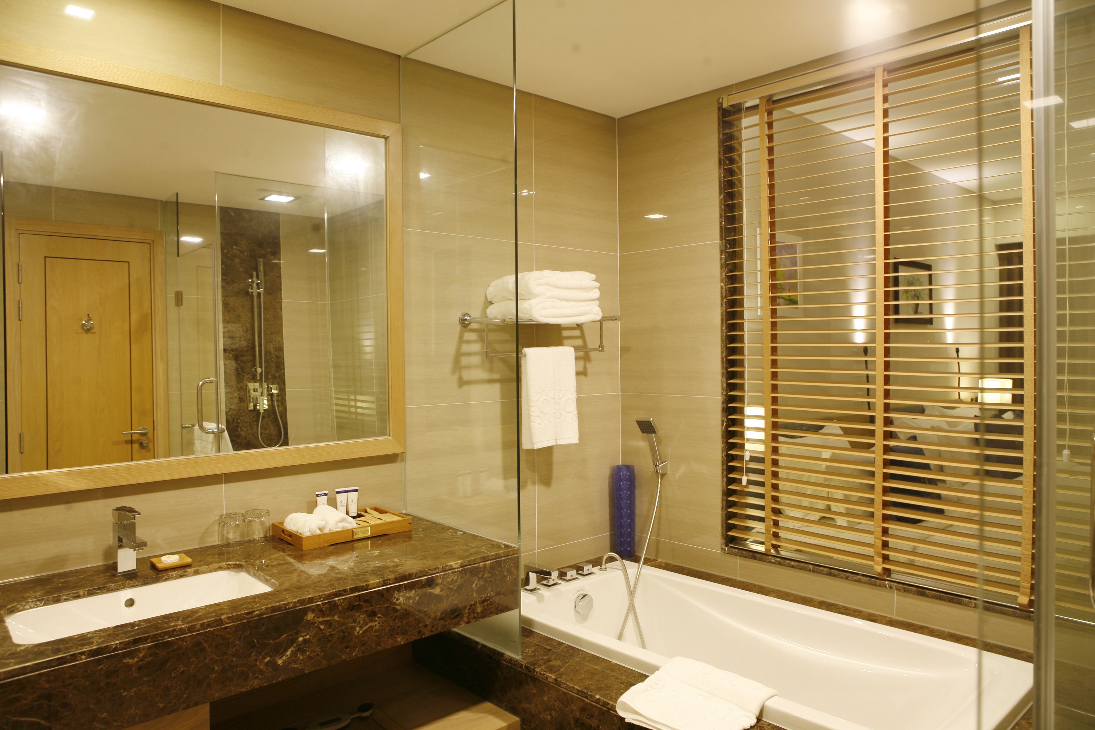 deluxe twin with window | bathroom | free toiletries, hair dryer, bathrobes, slippers