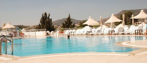 2 outdoor pools, pool umbrellas, sun loungers