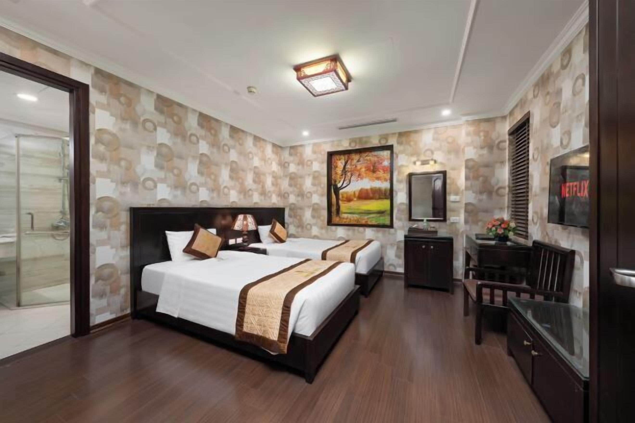 Ropa de cama de alta calidad y minibar 