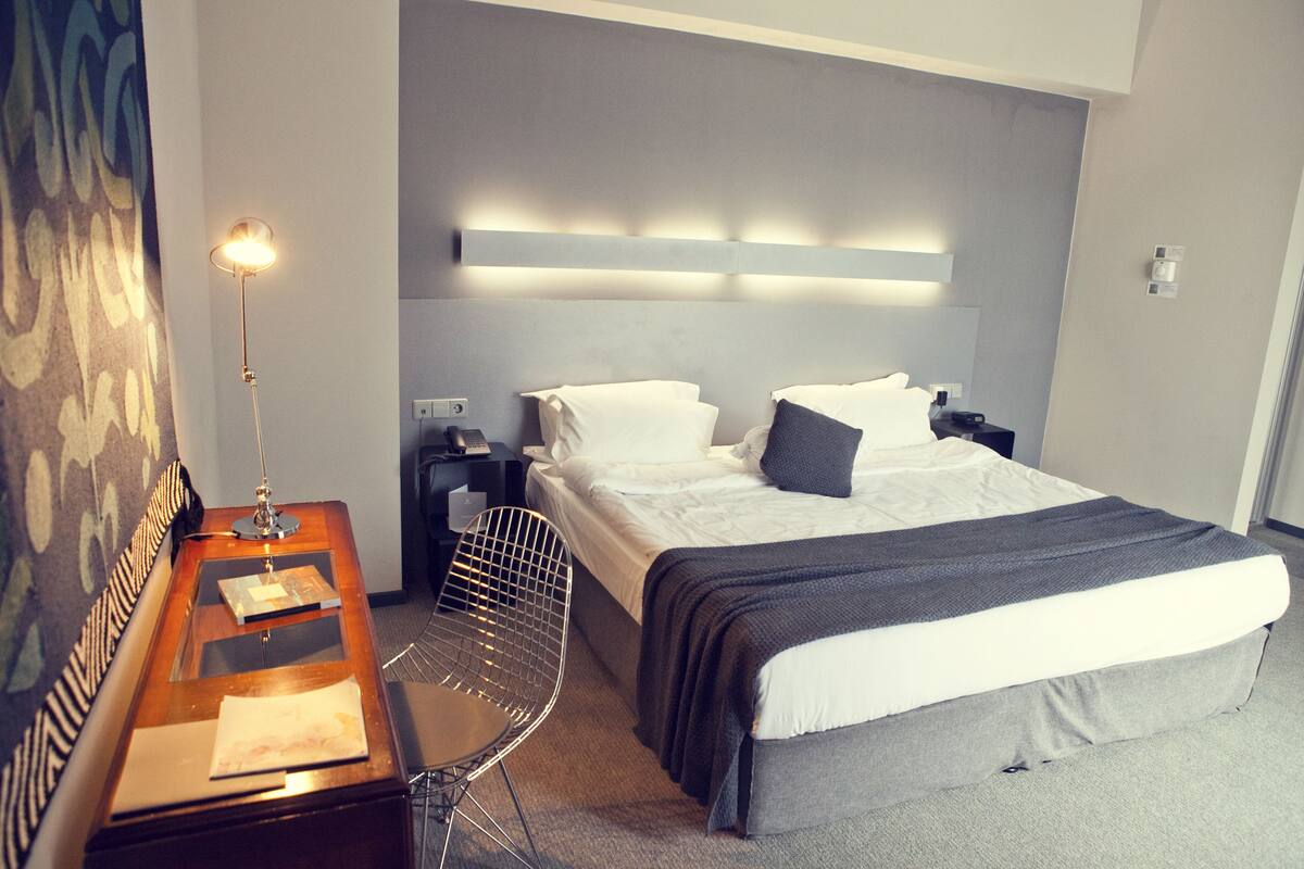 Duplex, 1 Bedroom, City View | Minibar, in-room safe, desk, soundproofing