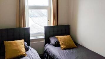 Egyptian cotton sheets, premium bedding, blackout drapes, free WiFi