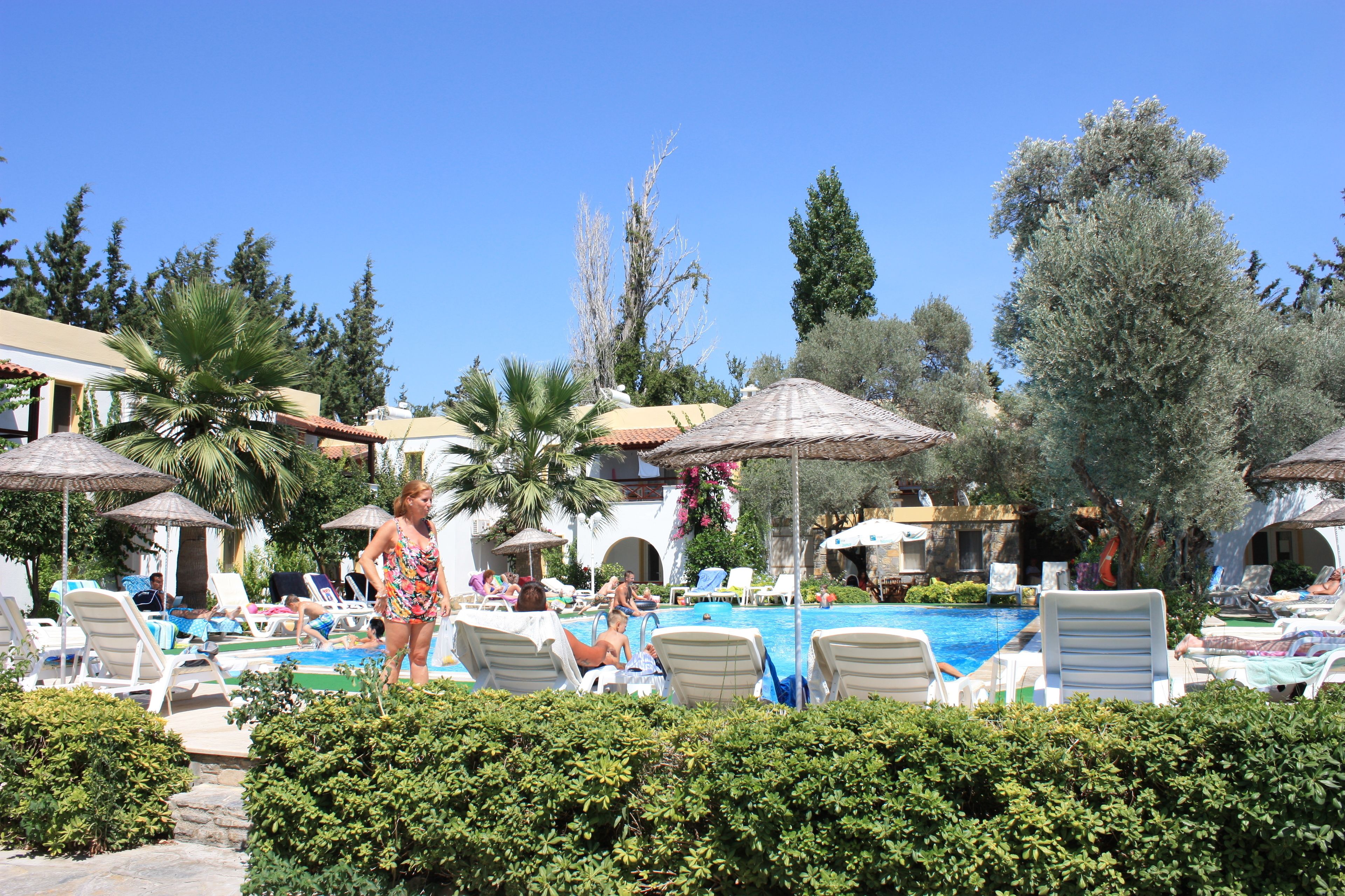 outdoor pool, pool umbrellas, pool loungers