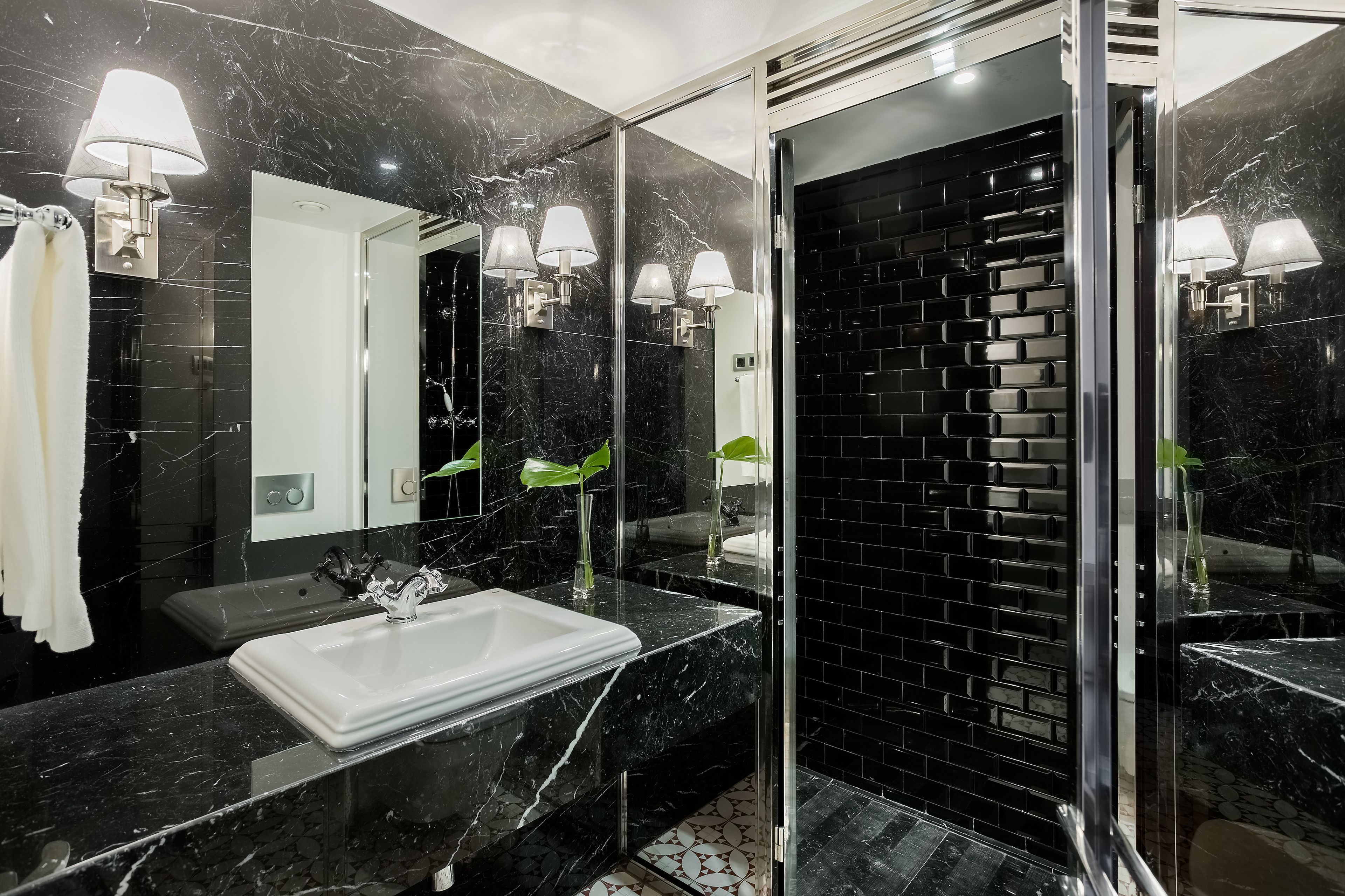 deluxe room | bathroom | designer toiletries, hair dryer, towels, soap
