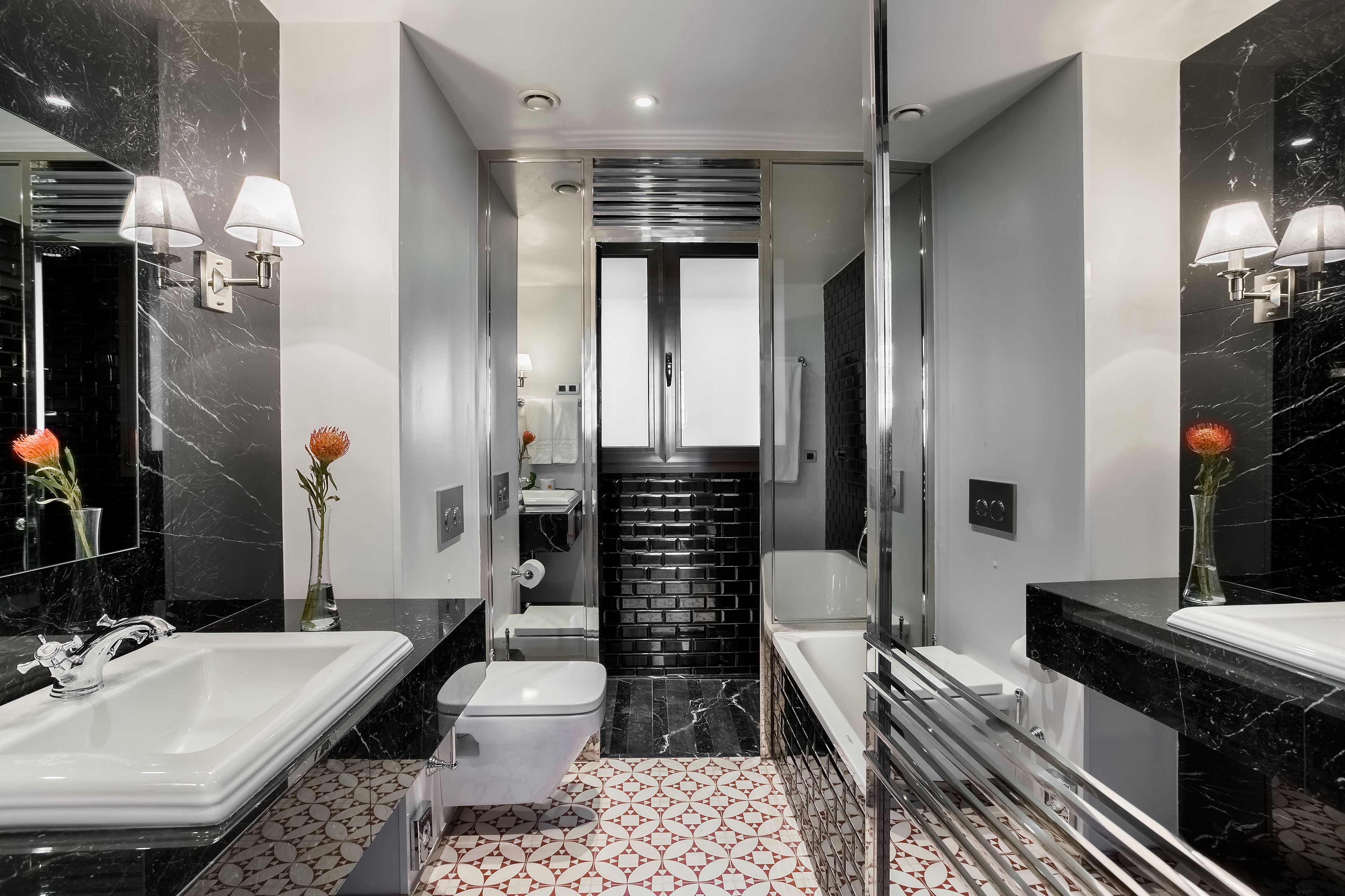 junior suite | bathroom | designer toiletries, hair dryer, towels, soap