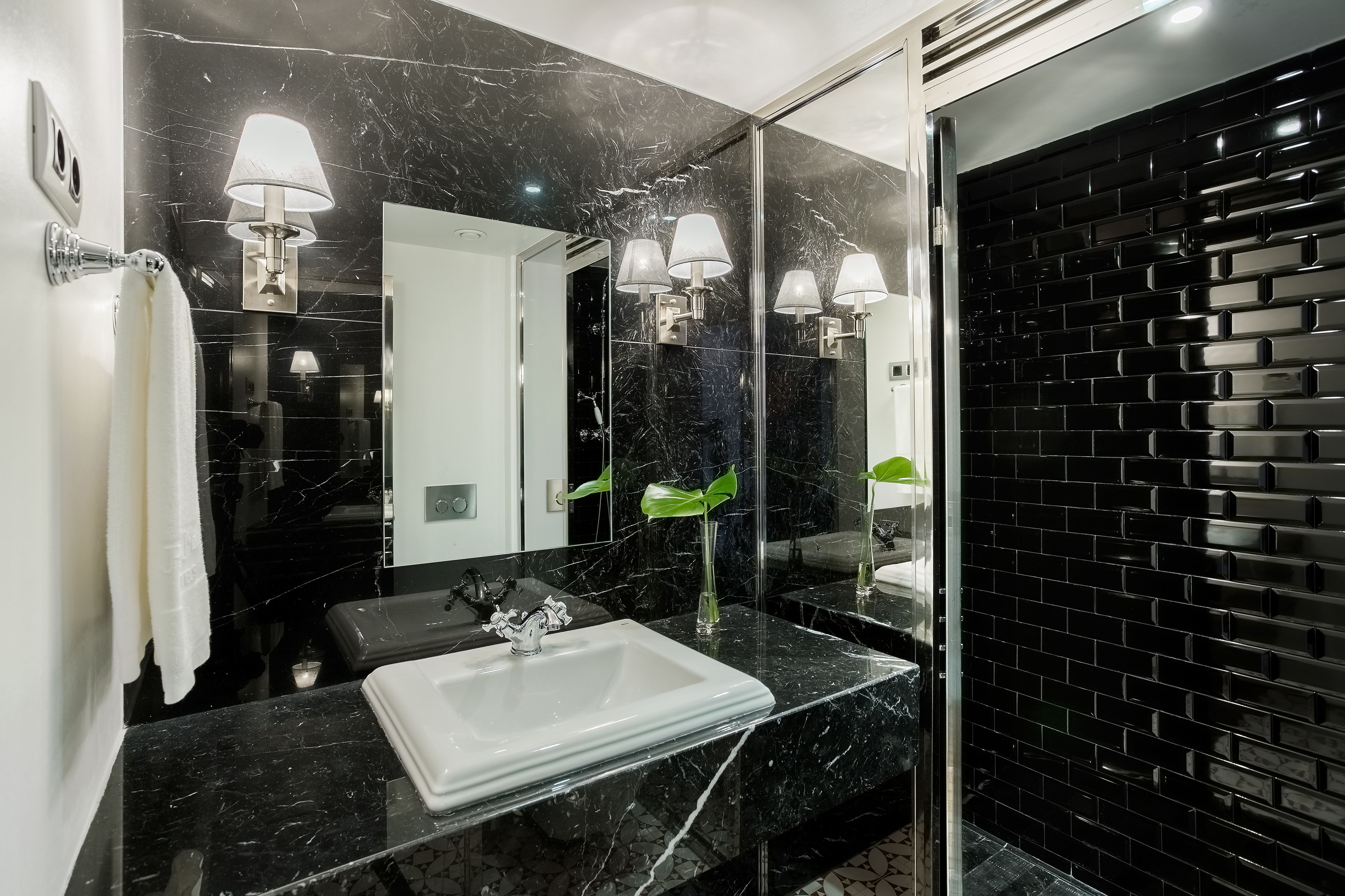 deluxe room | bathroom | designer toiletries, hair dryer, towels, soap