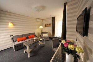 Premium bedding, memory-foam beds, in-room safe, desk