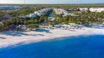 On the beach, white sand, free beach cabanas, sun-loungers