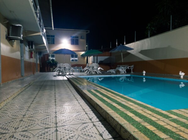 Outdoor pool, open 10:00 AM to 7:30 PM, pool umbrellas, pool loungers