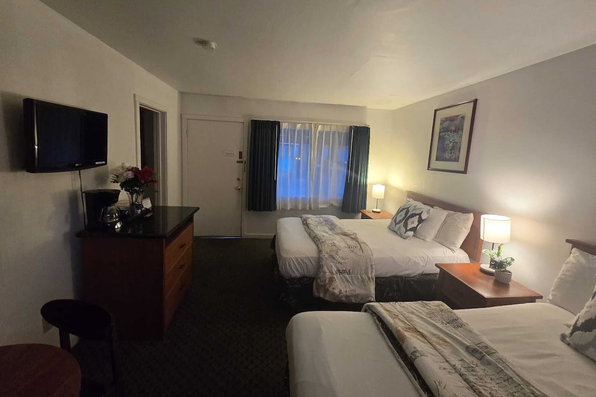 Premium bedding, blackout drapes, free WiFi, bed sheets