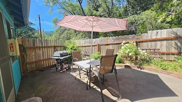 Family Suite, Multiple Beds, Garden Area | Terrace/patio