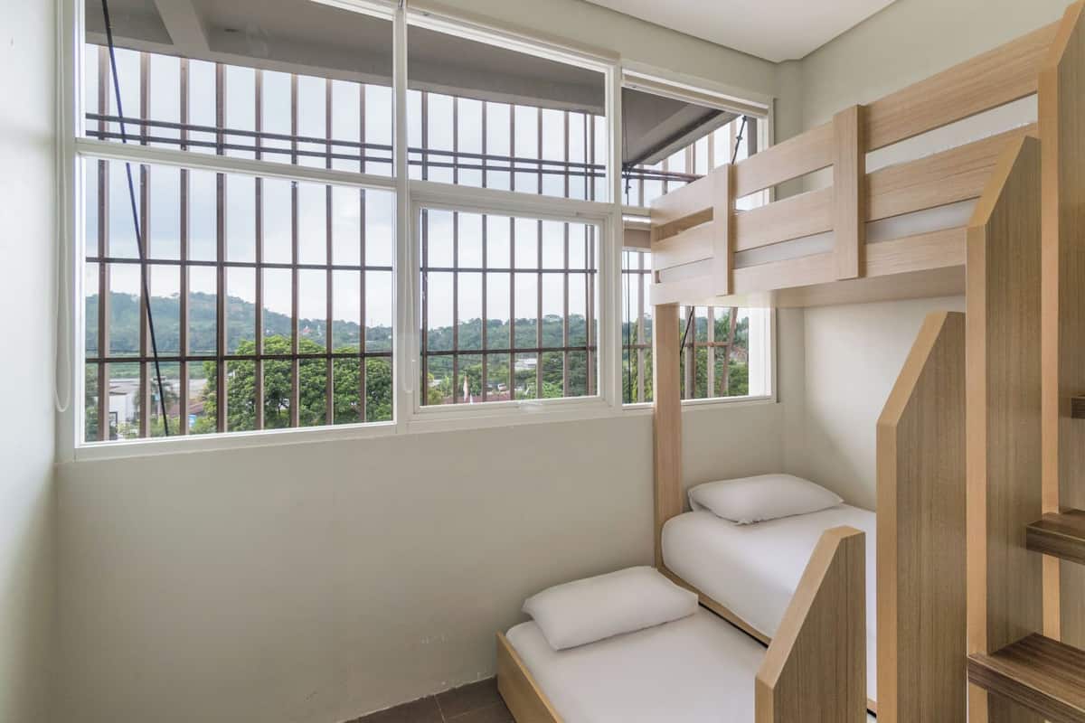 The Wujil Family Room | In-room safe, desk, laptop workspace, blackout drapes