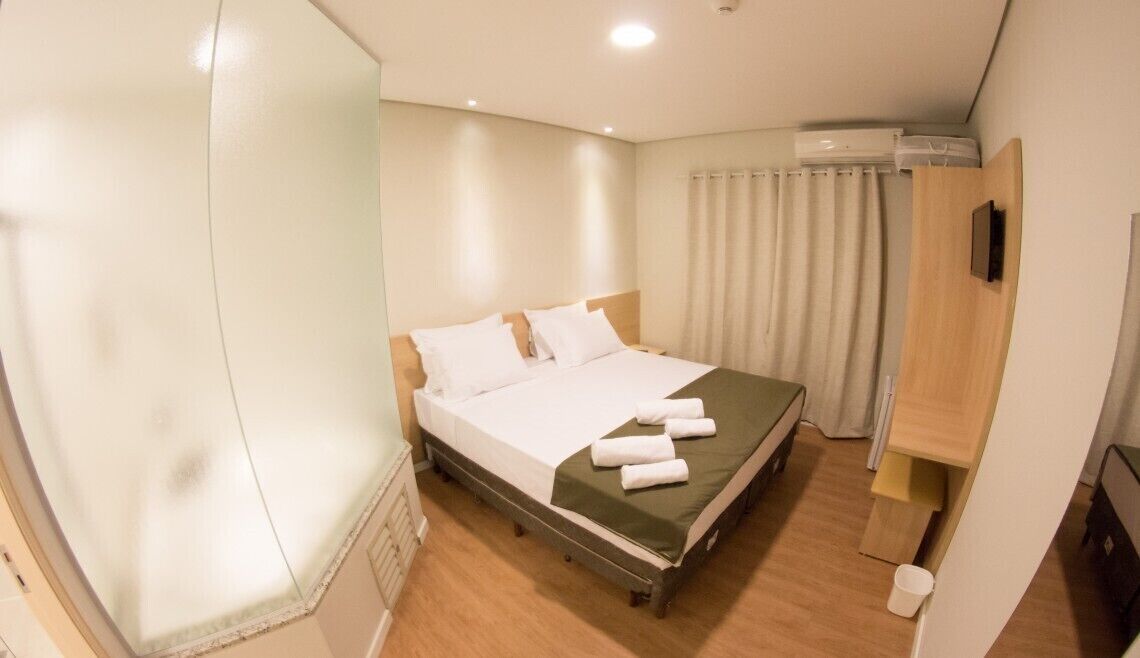 deluxe room, 1 king bed | minibar, individually furnished, desk, laptop workspace