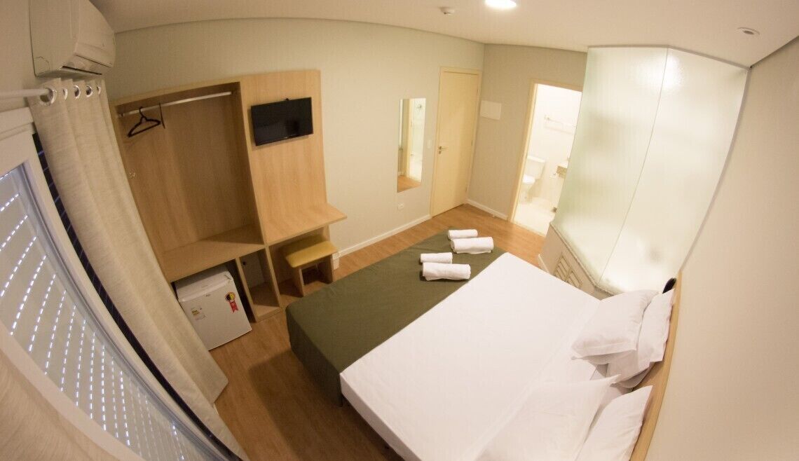 deluxe room, 1 king bed | minibar, individually furnished, desk, laptop workspace