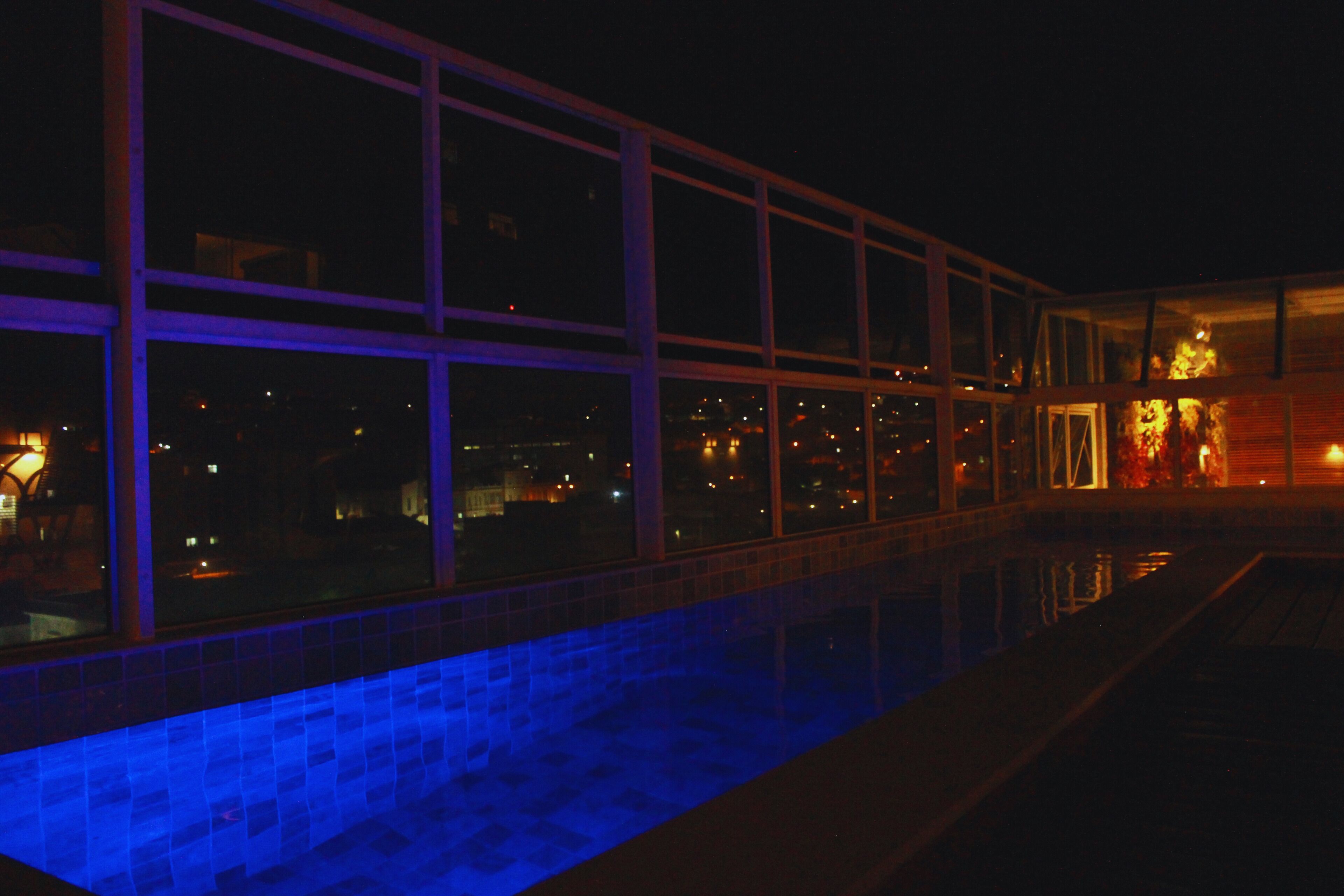 outdoor pool, open 9 am to 9 pm, pool umbrellas, pool loungers