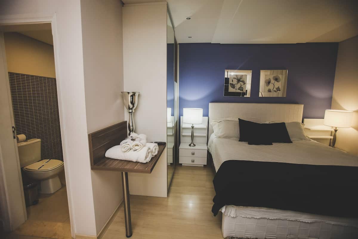 grand room | 1 bedroom, minibar, in-room safe, blackout curtains