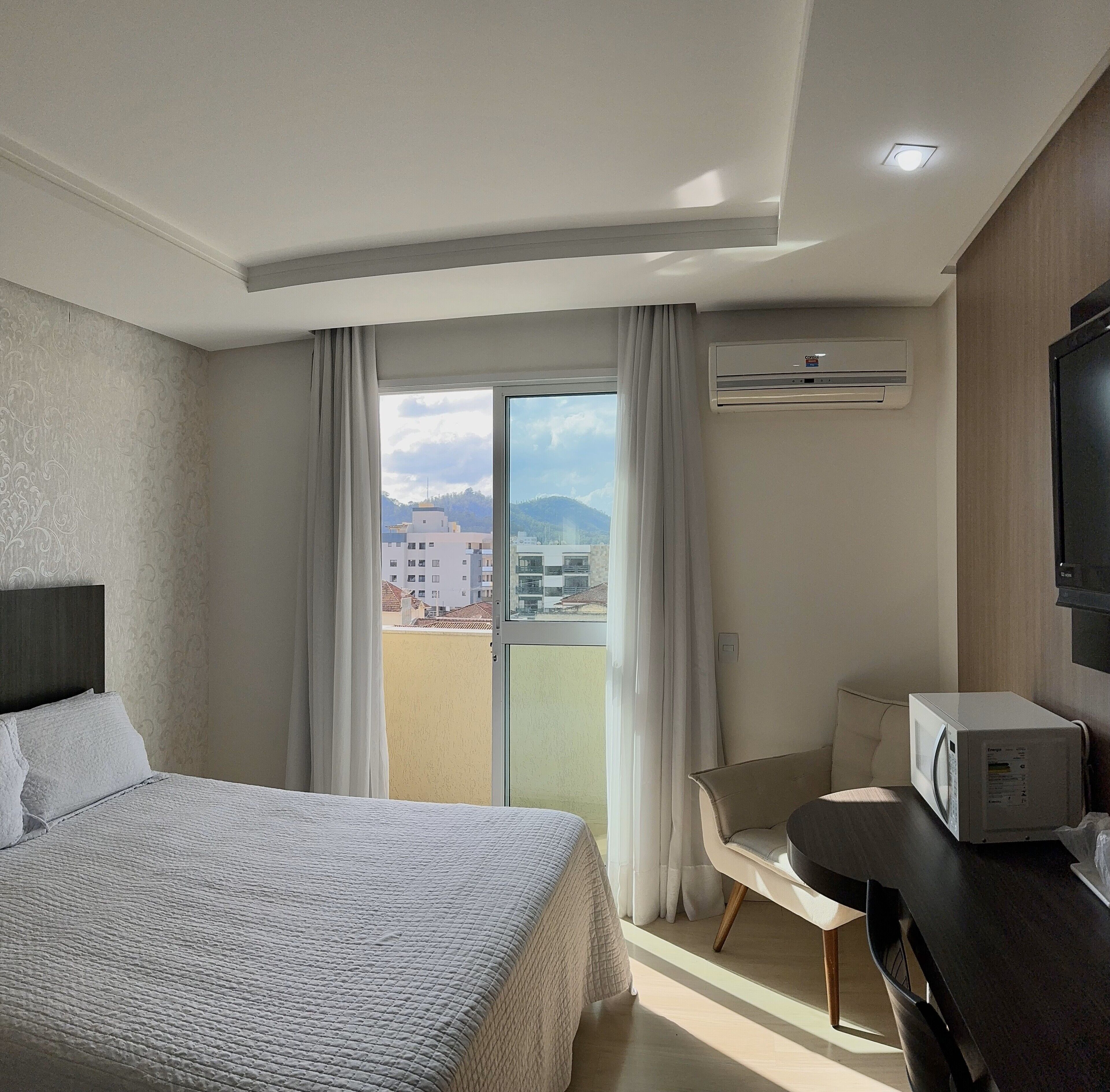 deluxe quadruple room | 1 bedroom, minibar, in-room safe, blackout curtains