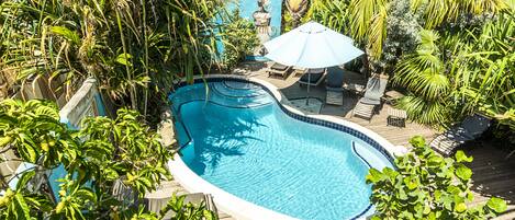 2 outdoor pools, open 7:00 AM to 8:00 PM, pool umbrellas, pool loungers