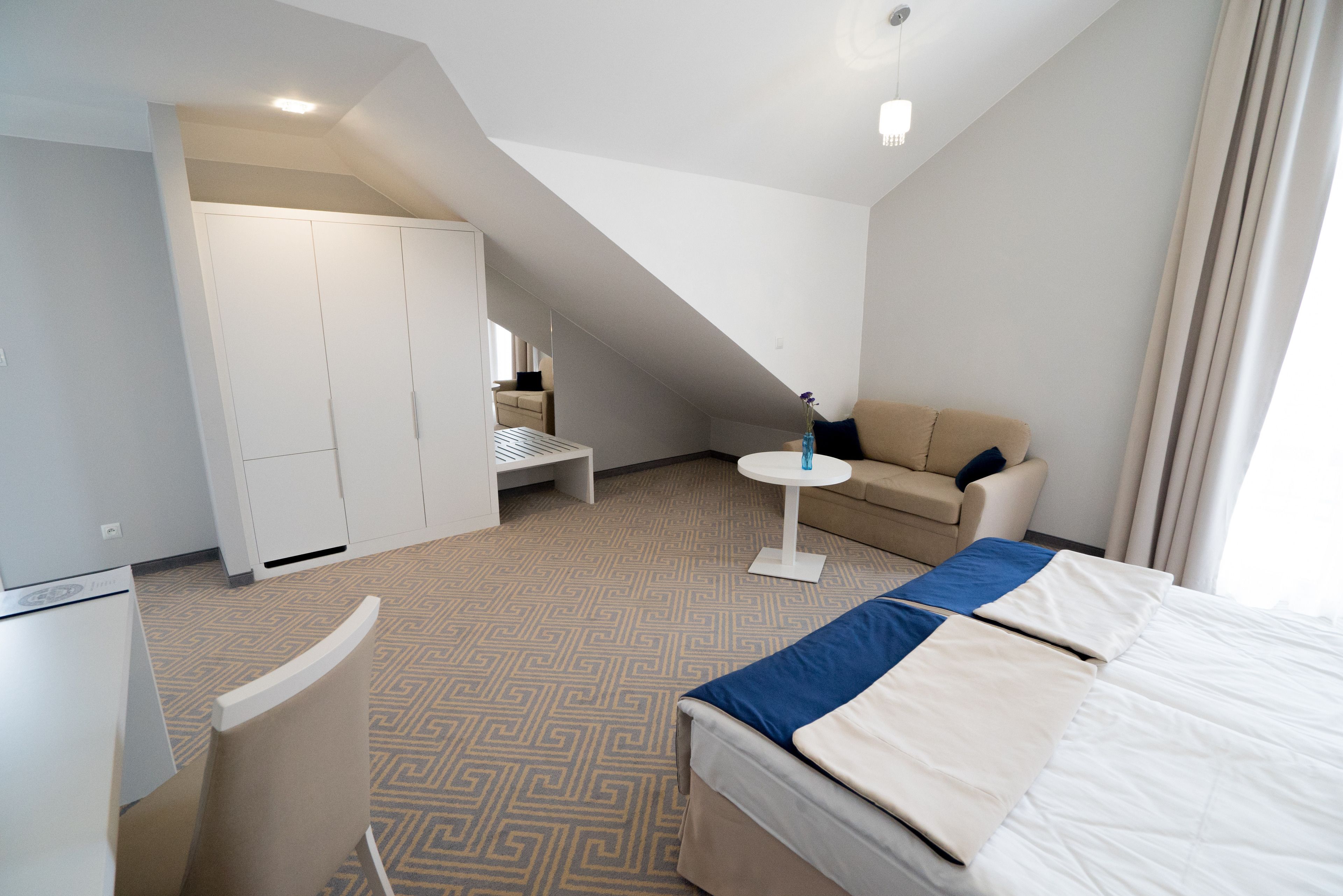 deluxe double room | in-room safe, desk, iron/ironing board, cots/infant beds