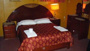 Individually decorated, desk, iron/ironing board, rollaway beds