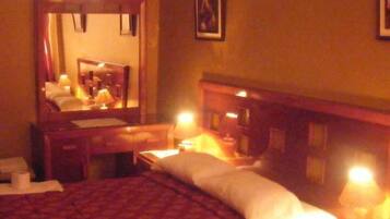 Individually decorated, desk, iron/ironing board, rollaway beds