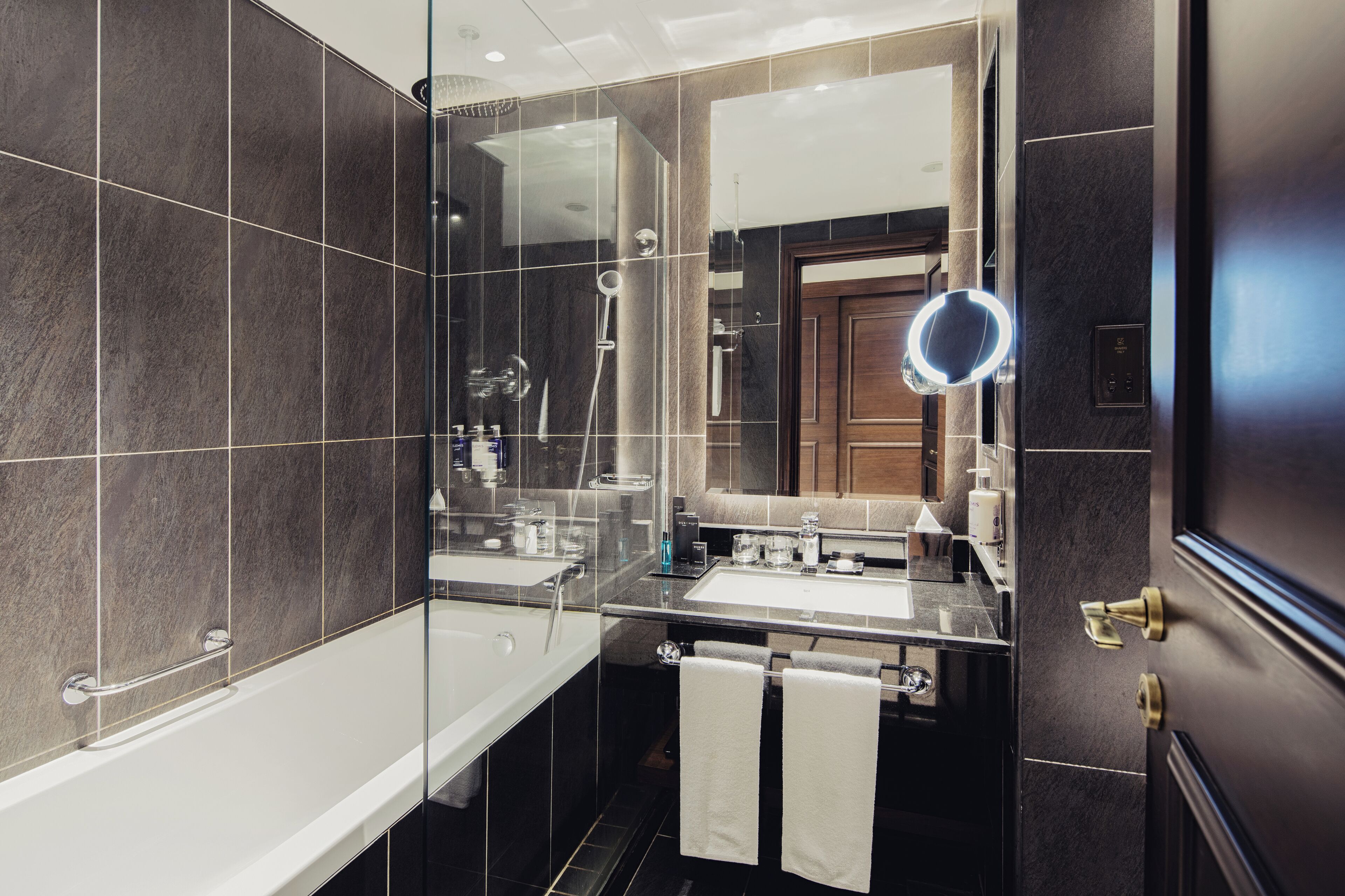 combined shower/bathtub, free toiletries, hair dryer, bathrobes