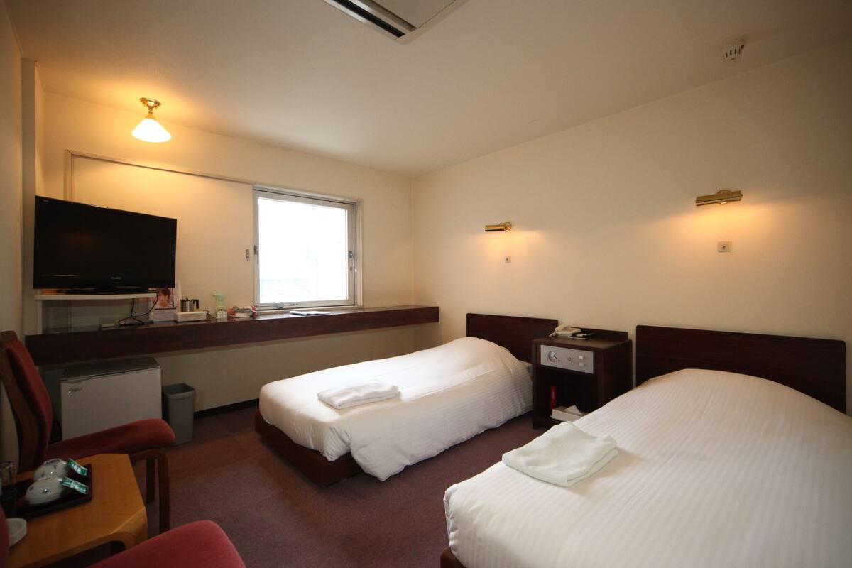 Iron/ironing board (on request), WiFi (free), bed sheets
