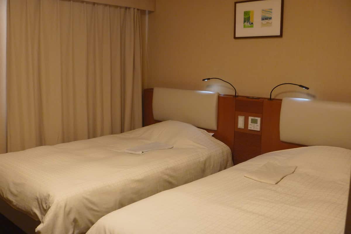 Escrivaninha, cortinas blackout, Wi-Fi de cortesia