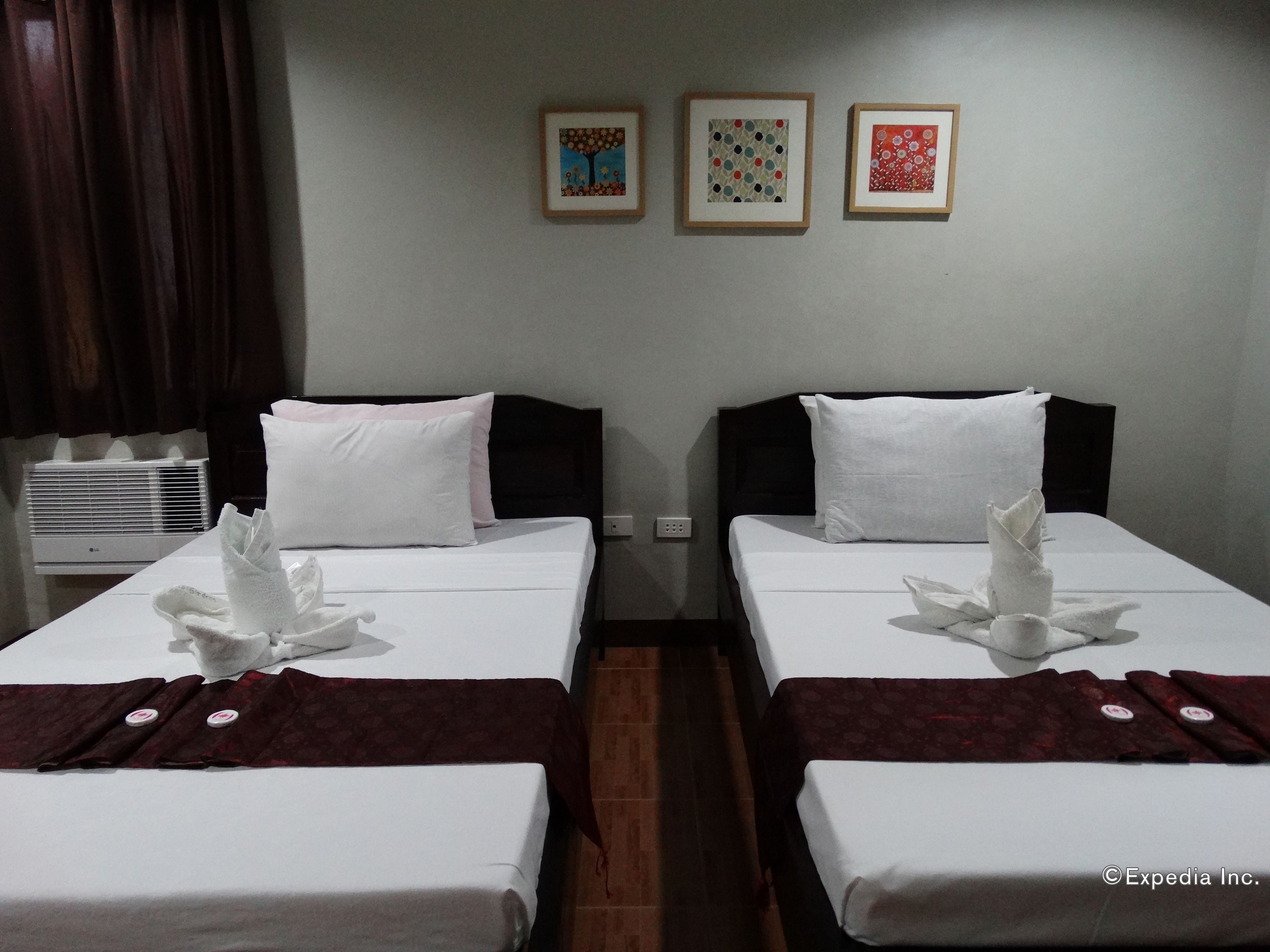 Foto - Harbour Gardens Tourist Inn