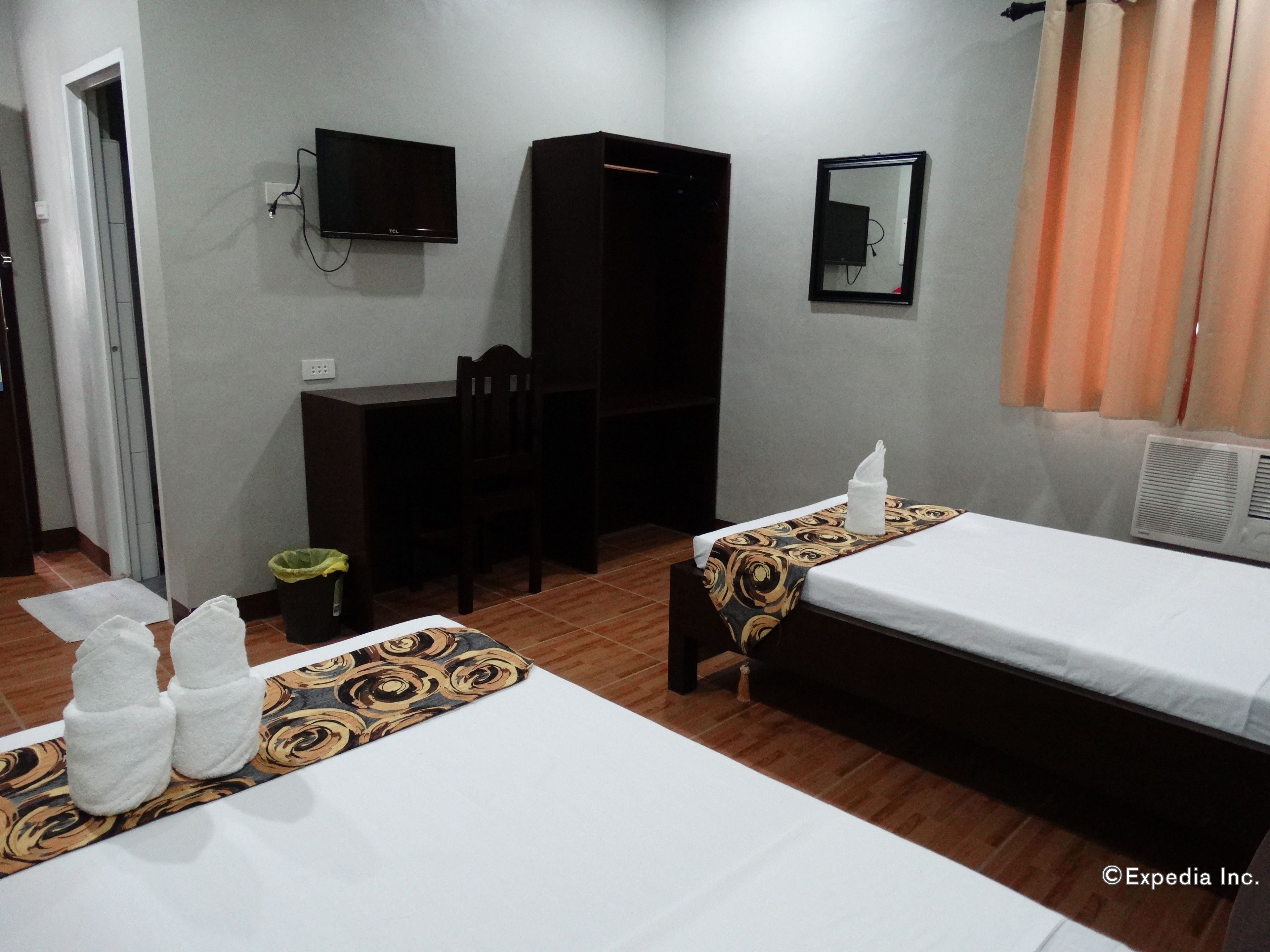 Foto - Harbour Gardens Tourist Inn