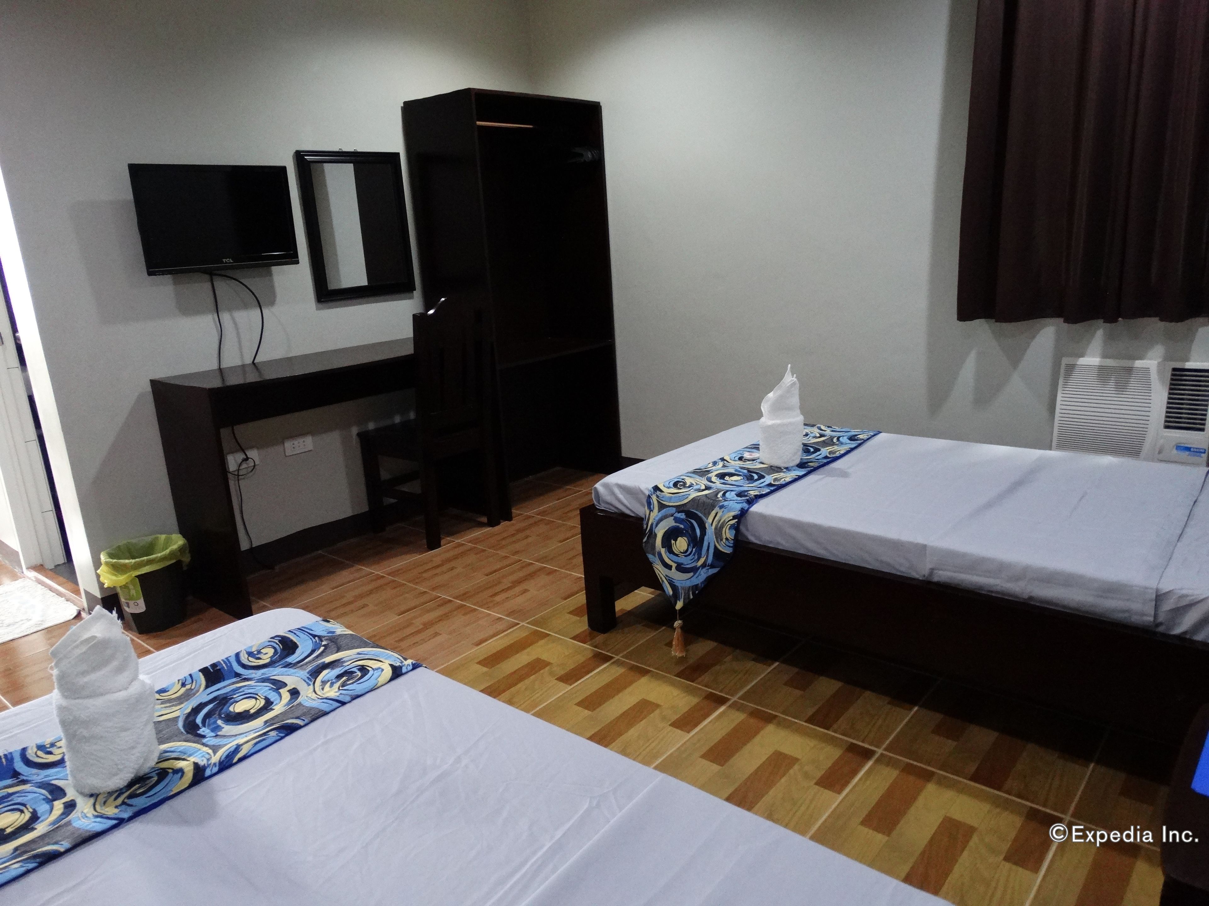 Foto - Harbour Gardens Tourist Inn