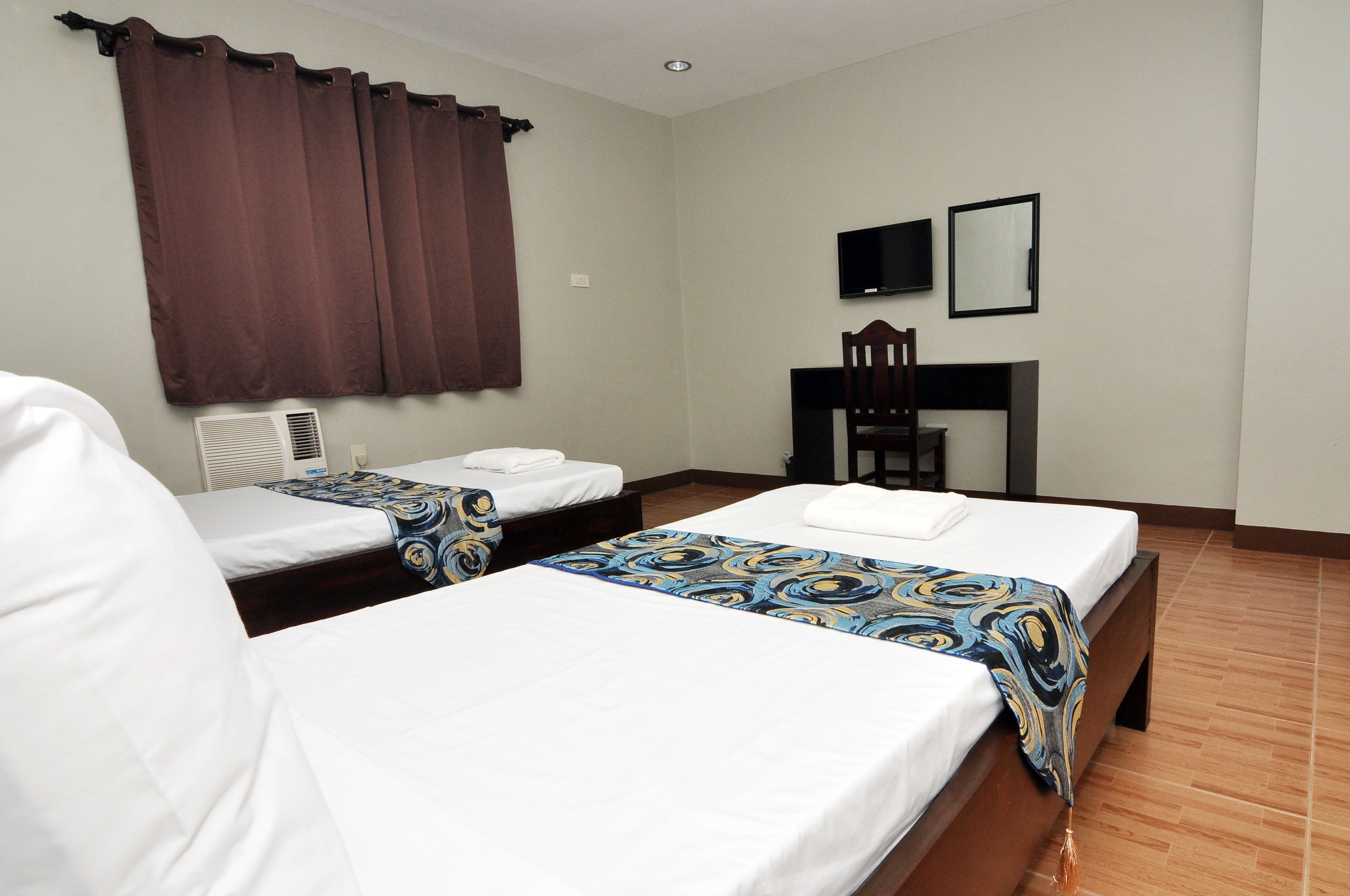 Foto - Harbour Gardens Tourist Inn