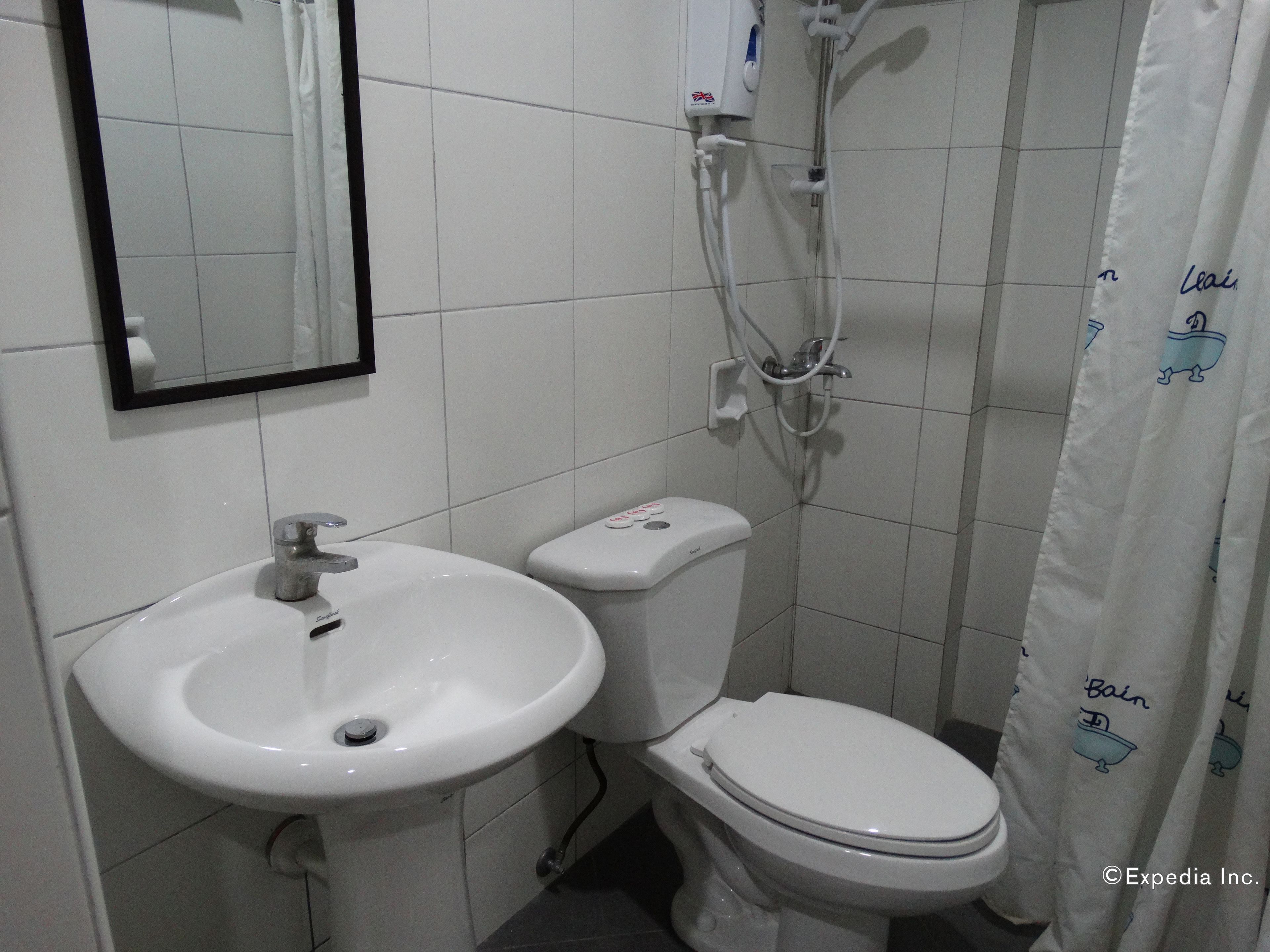 Foto - Harbour Gardens Tourist Inn