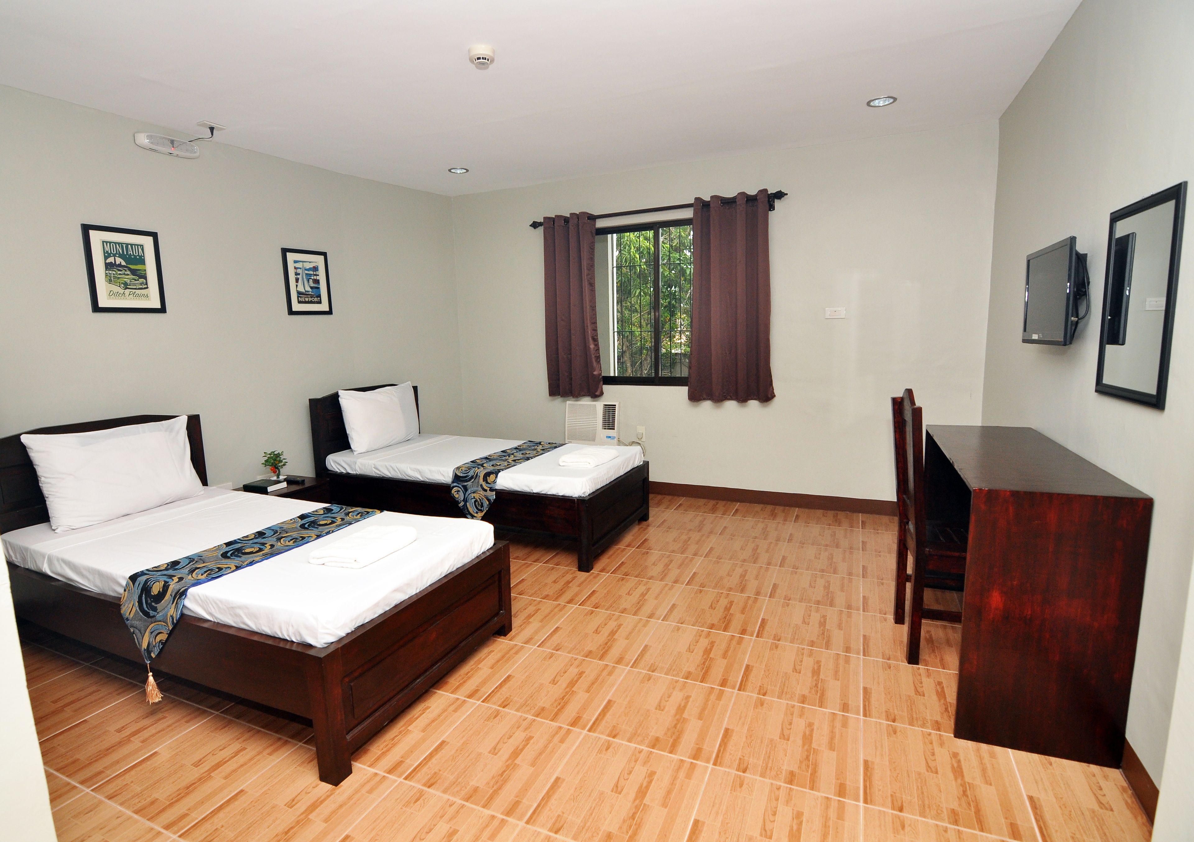 Foto - Harbour Gardens Tourist Inn