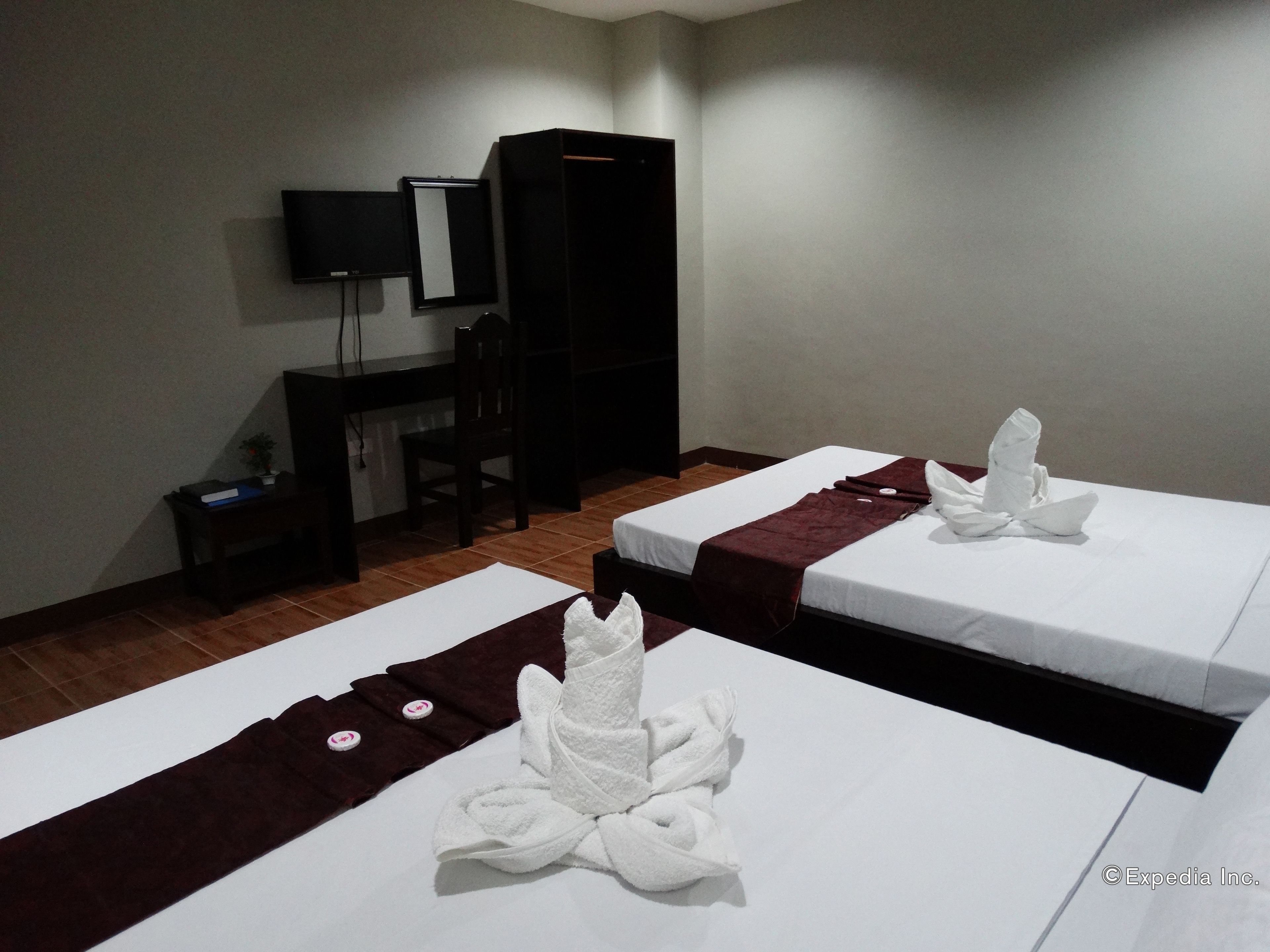 Foto - Harbour Gardens Tourist Inn