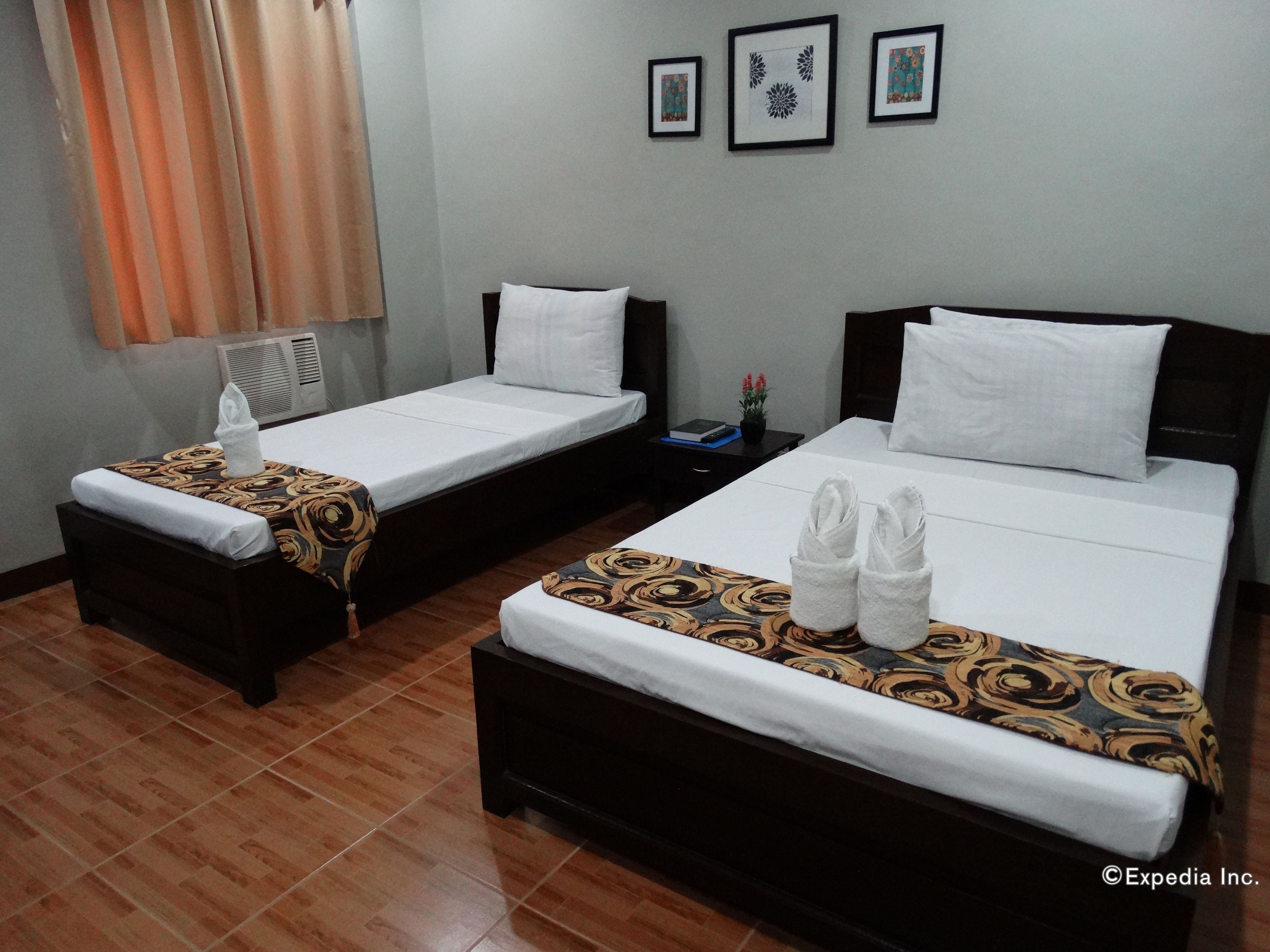 Foto - Harbour Gardens Tourist Inn