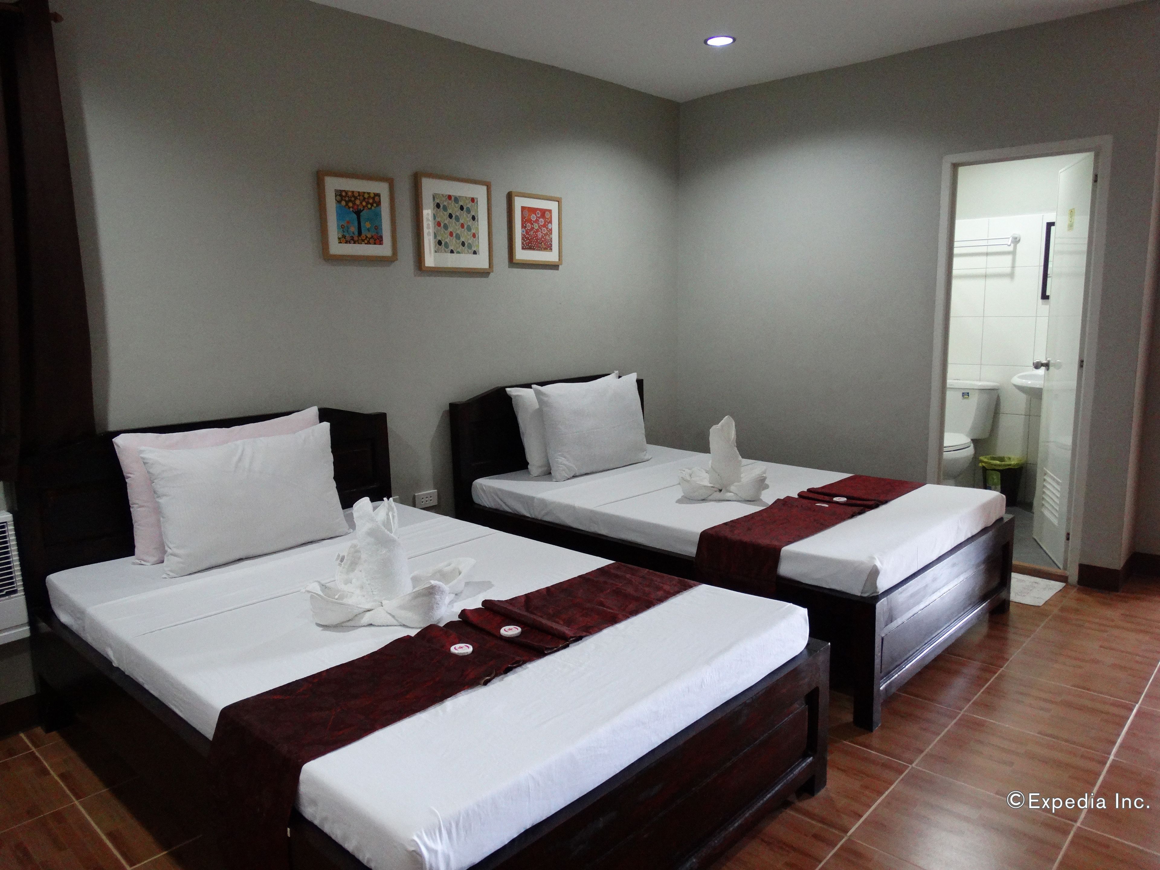 Foto - Harbour Gardens Tourist Inn