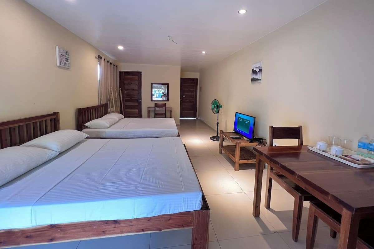 Standard Room, 2 Queen Beds | In-room safe, individually decorated, blackout drapes