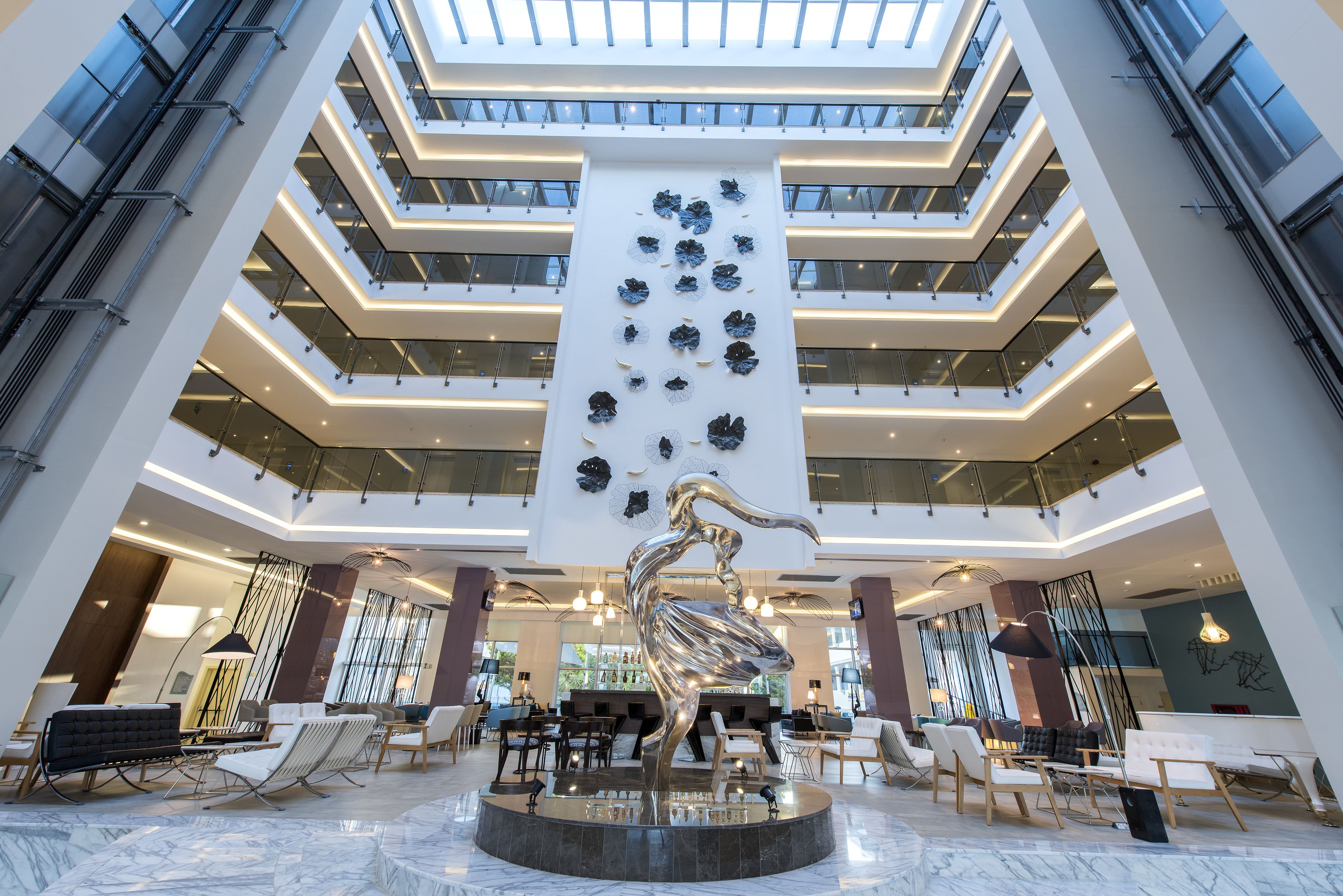 4 bars/lounges, poolside bar, beach bar