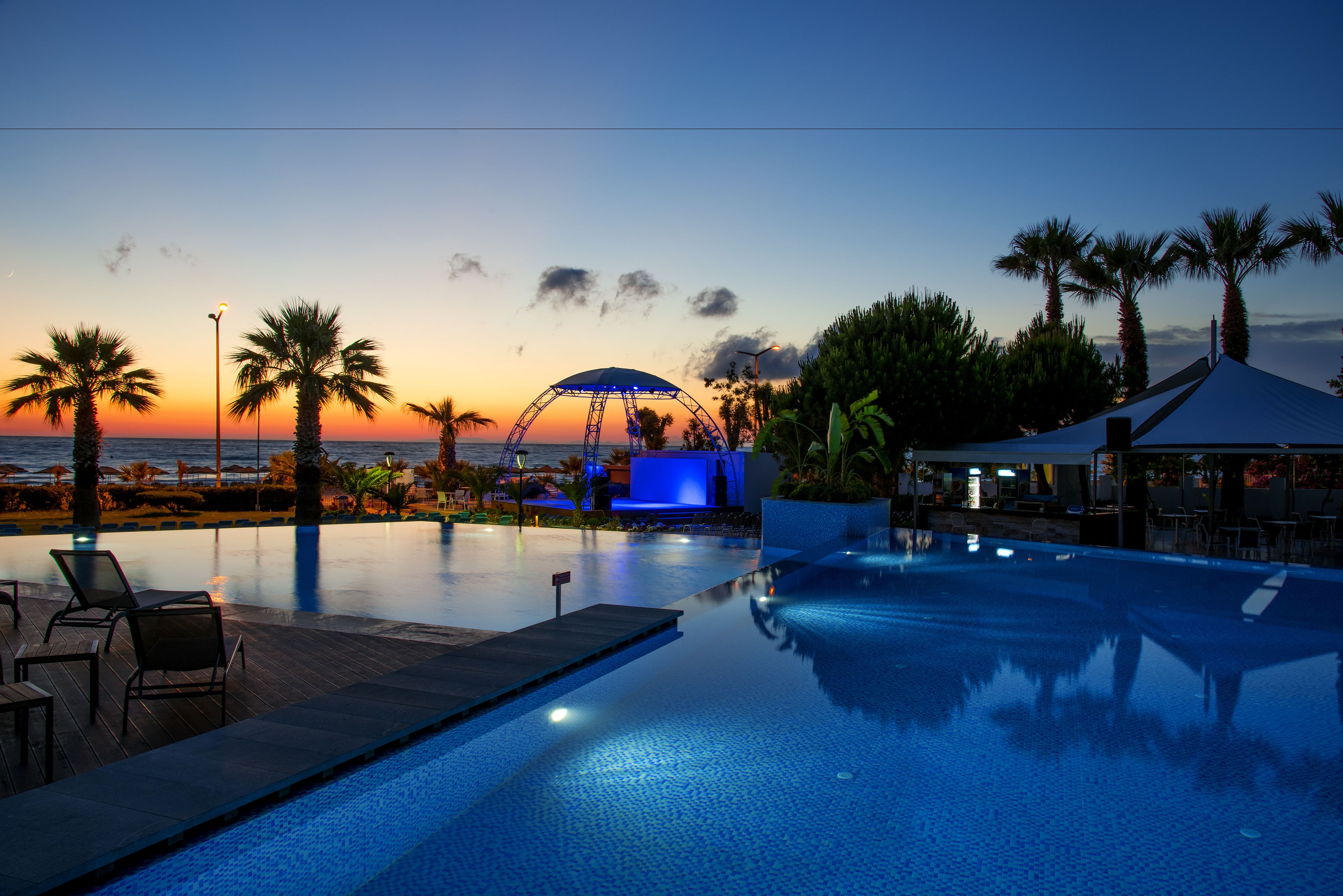 Indoor pool, outdoor pool, pool umbrellas, sun loungers