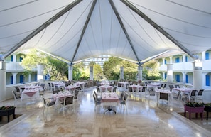Breakfast, lunch, dinner served; international cuisine, pool views