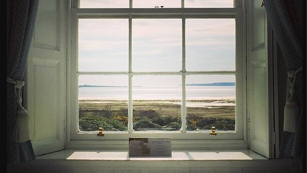 A window with a view of a landscape. - Islay House (Islay Island)