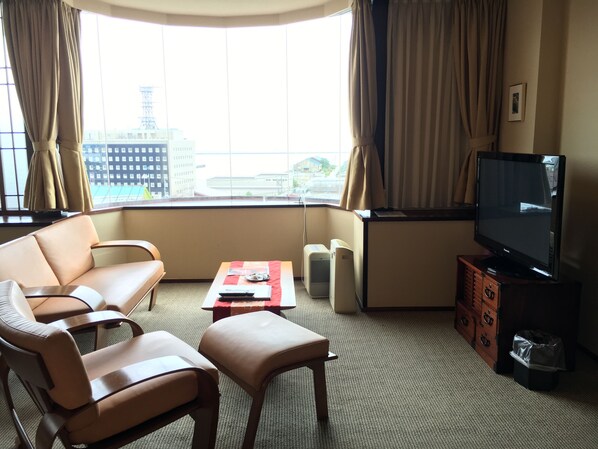 Premier-Dreibettzimmer, Nichtraucher | Wohnbereich