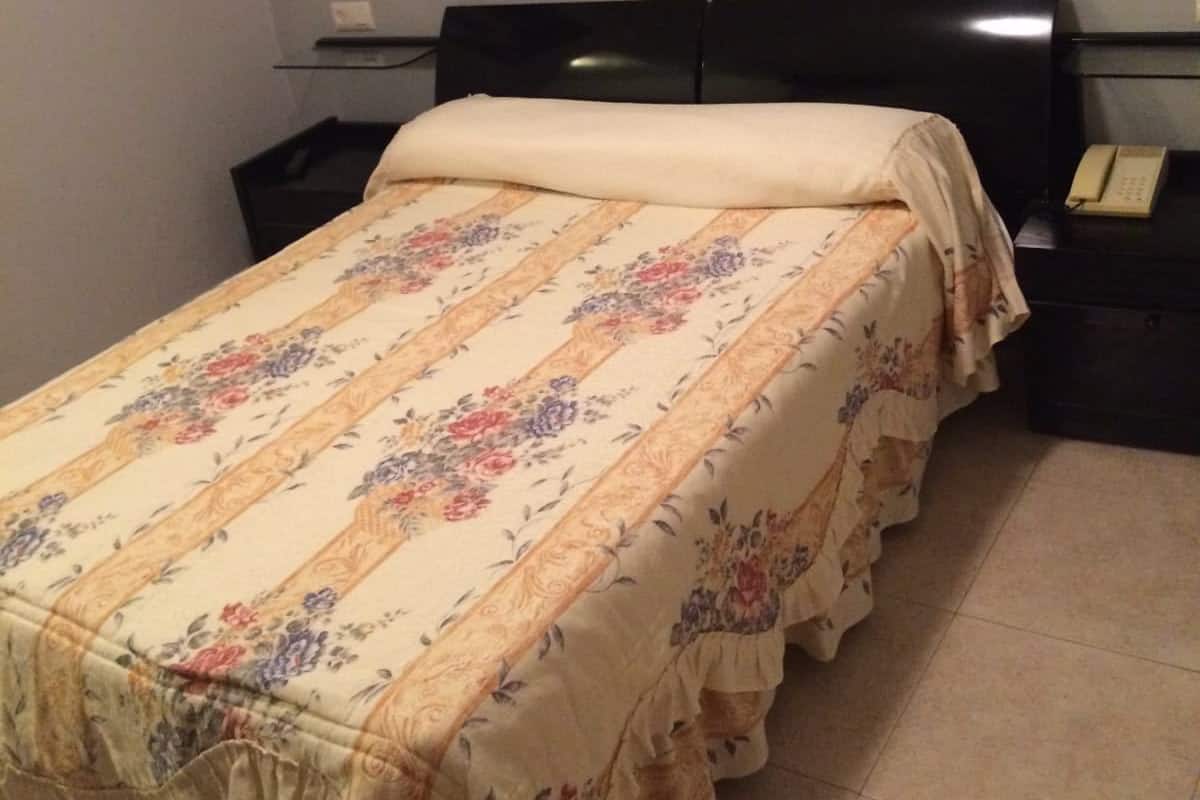 Klassieke eenpersoonskamer, 1 slaapkamer | Donsdekens, verduisterende gordijnen, gratis wifi