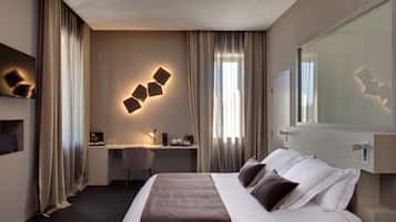 Ropa de cama de alta calidad y minibar con artículos gratuitos