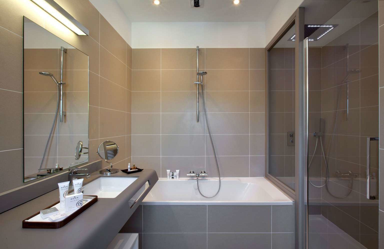 designer toiletries, hair dryer, bathrobes, slippers