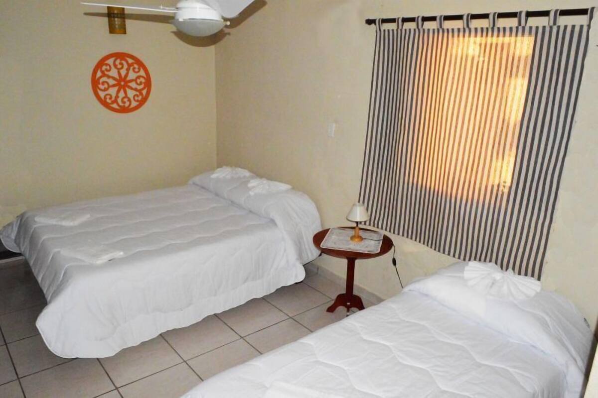 Habitación triple de lujo | Cunas gratuitas y wifi gratis