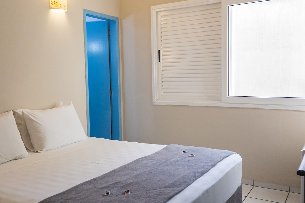 Economy Double or Twin Room | Minibar, iron/ironing board, free WiFi, bed sheets
